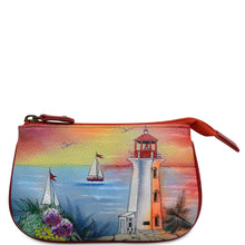 Load image into Gallery viewer, Anuschka style 1107, handpainted Medium Zip Pouch. Guiding Light painting in multi color. Featuring Great for keeping keys, coins, rings and other little things handy.
