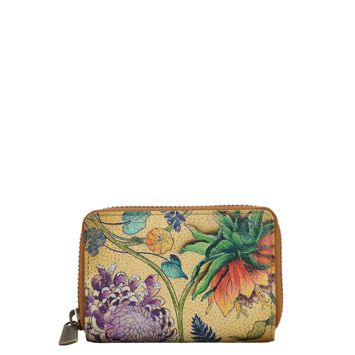 Anuschka style 1110, handpainted Accordion Style Credit And Business Card Holder. Caribbean Garden Painting in tan Color. Featuring all round zip entry to main compartment with Eleven Credit card holders.