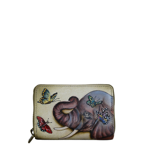 Anuschka style 1110, handpainted Accordion Style Credit And Business Card Holder. Gentle Giant Painting in ivory Color. Featuring all round zip entry to main compartment with Eleven Credit card holders.