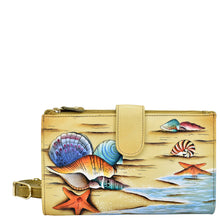 Load image into Gallery viewer, Anuschka style 1113, handpainted Cell Phone Case &amp; Wallet. Gift of the Sea painting in Multi color. Featuring twelve credit card holders, two ID windows, two slip-in multipurpose pockets and one full length bill pocket.
