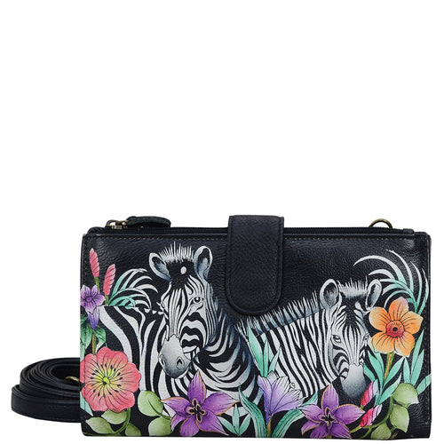 Anuschka style 1113, handpainted Cell Phone Case & Wallet. Playful Zebras painting in black color. Featuring twelve credit card holders, two ID windows, two slip-in multipurpose pockets and one full length bill pocket.