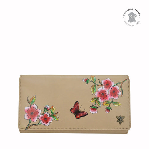 Anuschka style 1150, Three Fold Wallet. Flower Garden Almond painting in almond color. Featuring RFID blocking and many credit card slots.
