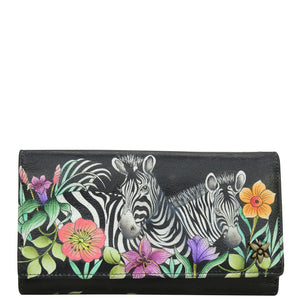 Anuschka style 1150, Three Fold Wallet.Playful Zebras painting in black color. Featuring RFID blocking and many credit card slots.