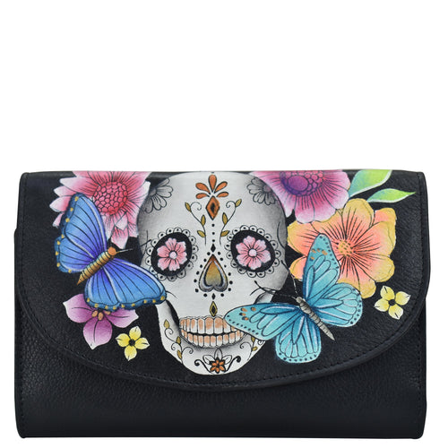 Anuschka style 1816, handpainted Ladies Tri Fold Wallet. Day of the Dead painting in Black color. Featuring one zippered compartment, two open bill compartment and thirteen card slots with one ID window.