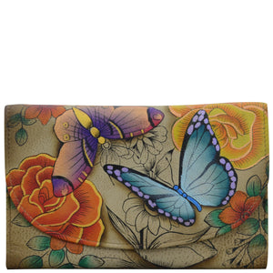 Anna by Anuschka style 1816, handpainted Ladies Tri Fold Wallet. Floral Paradise Tan painting in tan color. Featuring thirteen card slots with one ID window and checkbook holder.