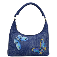 Load image into Gallery viewer, Anuschka style 371, handpainted Medium Zip Top Hobo. Garden of Delight Painting in Blue Color.Inside zippered wall pocket two multipurpose pockets.
