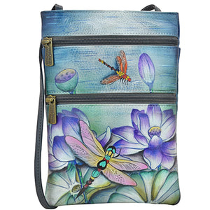 Anuschka style 448, handpainted Mini Double Zip Travel Crossbody. Tranquil Pond Painted in Multi Color. Featuring main compartment with magnetic closure and key holder.
