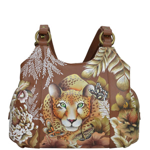 Anuschka style 469, Triple Compartment Satchel. Cleopatra's Leopard painting in tan color. Fits tablet, E-Reader with Built-in organizer.