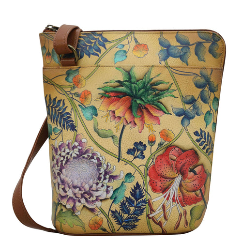 Anuschka style 493, handpainted Organizer Crossbody With Extended Side Zipper. Caribbean Garden Painted in Tan Color. Featuring inside zippered partition pocket, zippered back wall pocket Multi-purpose pocket, two penholders and pullout credit card/ ID holder.
