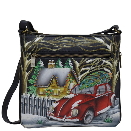 Anuschka style 550, handpainted Expandable Travel Crossbody. Hippie Holiday painting in black color. Fits Tablet and E-Reader.
