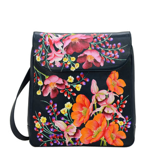 Anuschka style 661, handpainted Large Travel Backpack. Moonlit Meadow Painted in Blue Color. Featuring Inside one zippered wall pocket, one wall pocket and two multipurpose pockets with gusset with adjustable shoulder straps.