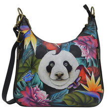 Load image into Gallery viewer, Anuschka style 662, handpainted Convertible Slim Hobo With Crossbody Strap, Happy Panda painting in Green color. Featuring two multipurpose pockets with gusset. slip in cell pocket.
