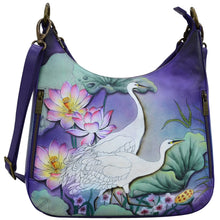 Load image into Gallery viewer, Anuschka Style 662, handpainted Convertible Slim Hobo With Crossbody Strap. Peaceful Garden painting

