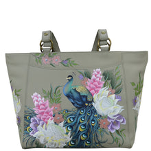Load image into Gallery viewer, Anuschka style 664, handpainted Classic Work Tote. Regal Peacock Painted in Grey Color. Featuring Inside one zippered wall pocket, one open wall pocket and three multipurpose pockets with gusset.
