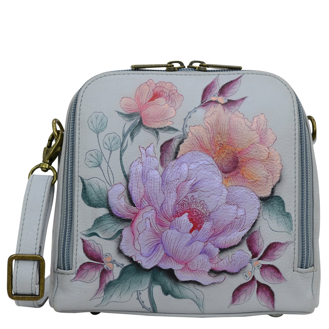 Anuschka style 668, handpainted Zip Around Travel Organizer. Bel Fiori Painted in Grey Color. Featuring inside four RFID protected card holder, top zippered pocket with gusset, one slip in pocket, one multipurpose pocket with gusset and rear full length slip in pocket with magnetic closure.