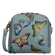 Load image into Gallery viewer, Anuschka style 668, handpainted Zip Around Travel Organizer. Butterfly Heaven painting in Green or Mint Color. Featuring RFID blocking.
