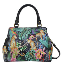 Load image into Gallery viewer, Anuschka style 690, handpainted Multi Compartment Satchel. Jungle Queen painting in Black color. Featuring inside one zippered wall pocket, one full length wall pocket, two multipurpose pockets and rear full length zippered wall pocket, slip in cell pocket with removable adjustable shoulder strap.
