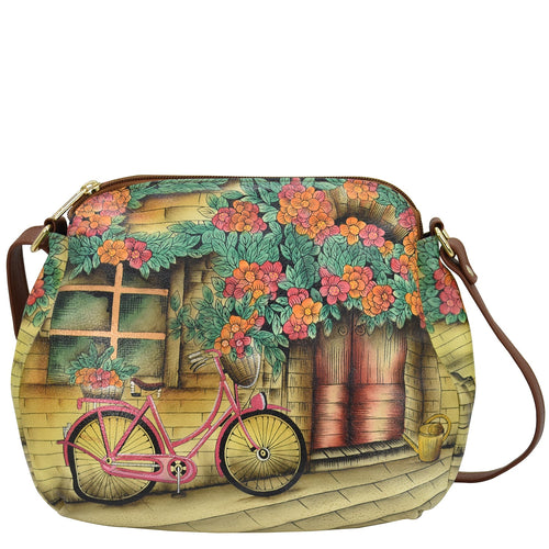 Anuschka style 691, Multi Compartment Medium Bag. Vintage Bike painting in Multi color. Featuring two multipurpose pockets with gusset.