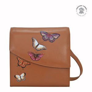 Anuschka style 692, handpainted Flap Messenger Crossbody. Butterflies Honey painting in tan color.Featuring RFID blocking and many credit card slots.