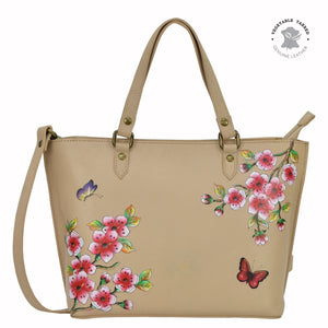 Anuschka style 693, Medium Tote. Flower Garden Almond painting in Tan color. Top zip entry, Removable handle with full adjustability,