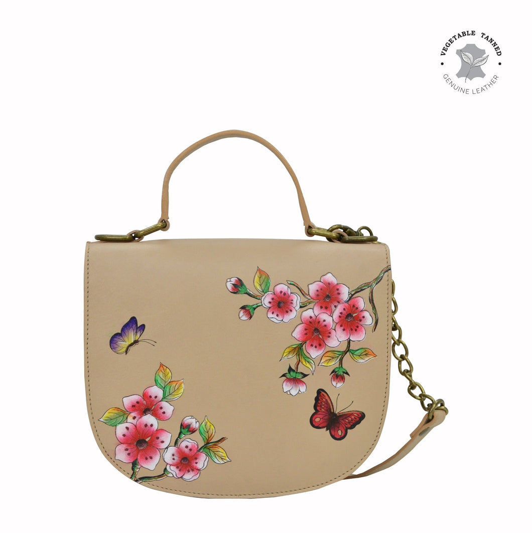 Anuschka style 694, Flap Crossbody. Flower Garden Almond painting in Tan color. Featuring magnetic snap button entry with Removable fully adjustable handle strap.