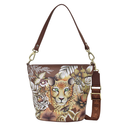 Anuschka style 699, Handpainted Tall Bucket Hobo. Cleopatra's Leopard painting in Tan Color. Featuring Rear full length zip pocket, slip in cell pocket.