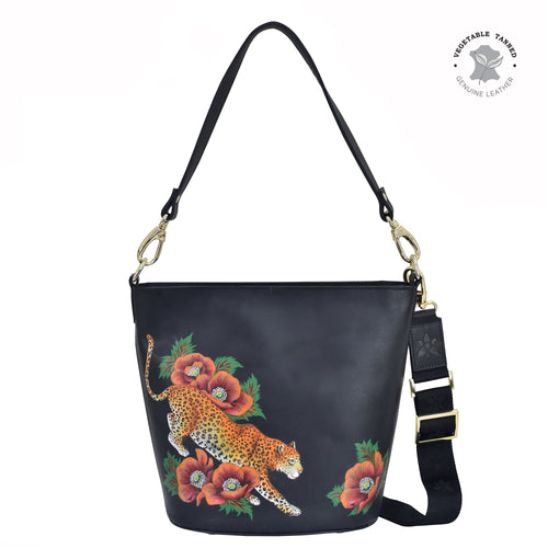 Anuschka style 699, Handpainted Tall Bucket Hobo. Enigmatic Leopard painting in Black color. Featuring Rear full length zip pocket, slip in cell pocket.