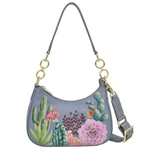 Anuschka style 701, Small Convertible Hobo. Desert Garden painting in grey color. Featuring Rear full length zip pocket & Removable adjustable crossbody web strap.