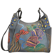 Load image into Gallery viewer, Anna by Anuschka style 8060, handpainted Large Multi Pocket Hobo. Rose Safari Grey painting in grey color. Featuring inside zippered wall pocket and two multipurpose pockets.
