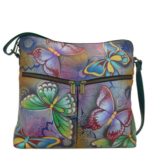 Anna by Anuschka style 8202, handpainted Large Hobo. Butterfly Paradise painting in grey color. Featuring inside one full length zippered wall pocket, one open wall pocket, two multipurpose pockets, Fits E-Reader, Fits tablet.